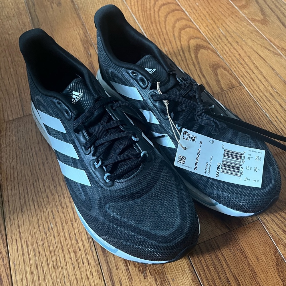 Adidas Black and White Athletic Shoes with Signature Stripes